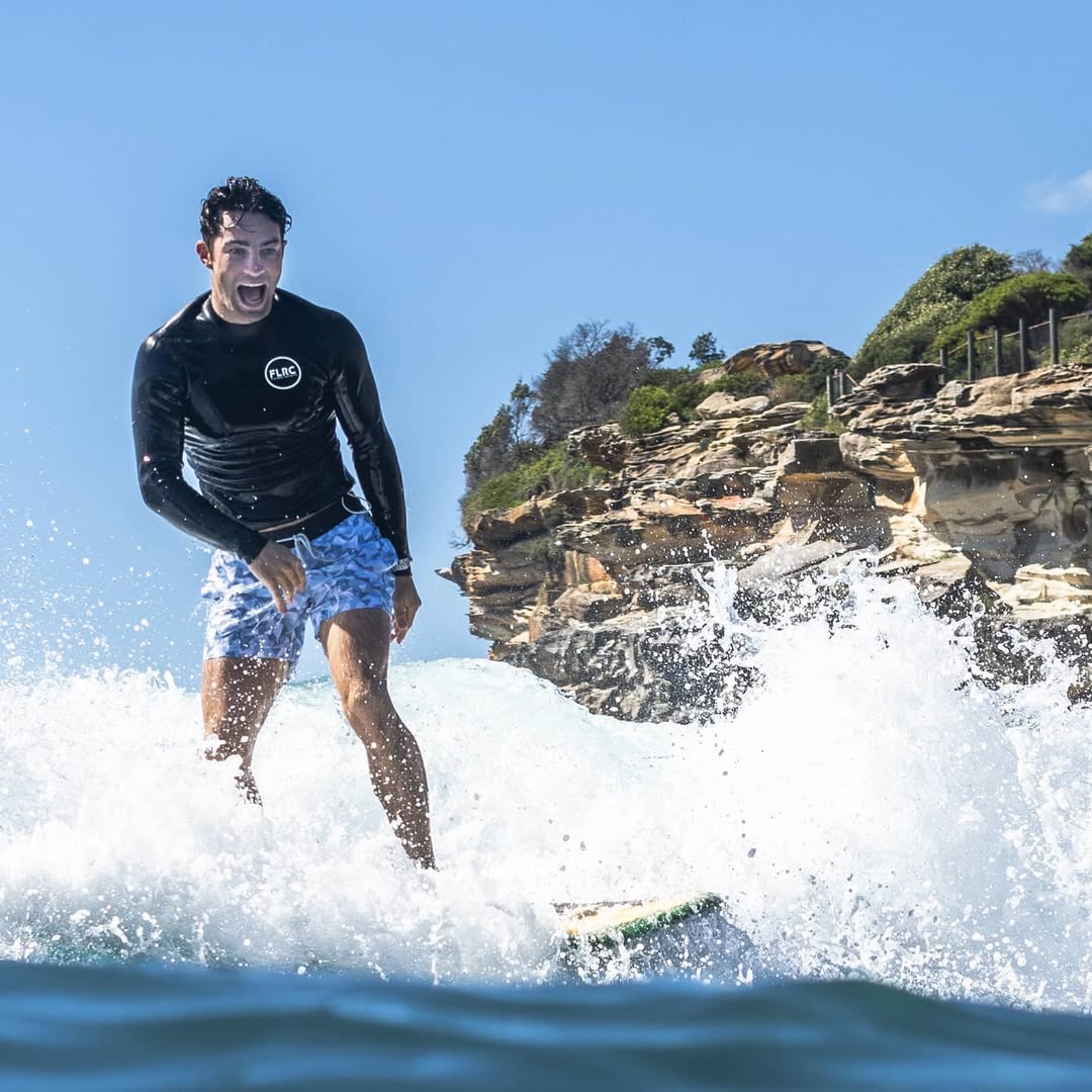 6 Pre-Surf Stretches to Prevent Shoulder Injuries (And Surf Longer) - Flatrock Surf